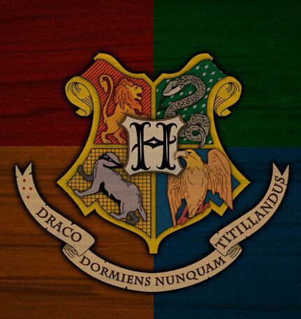 the hogwarts crest is on top of a wooden paneled wall with two coats of arms