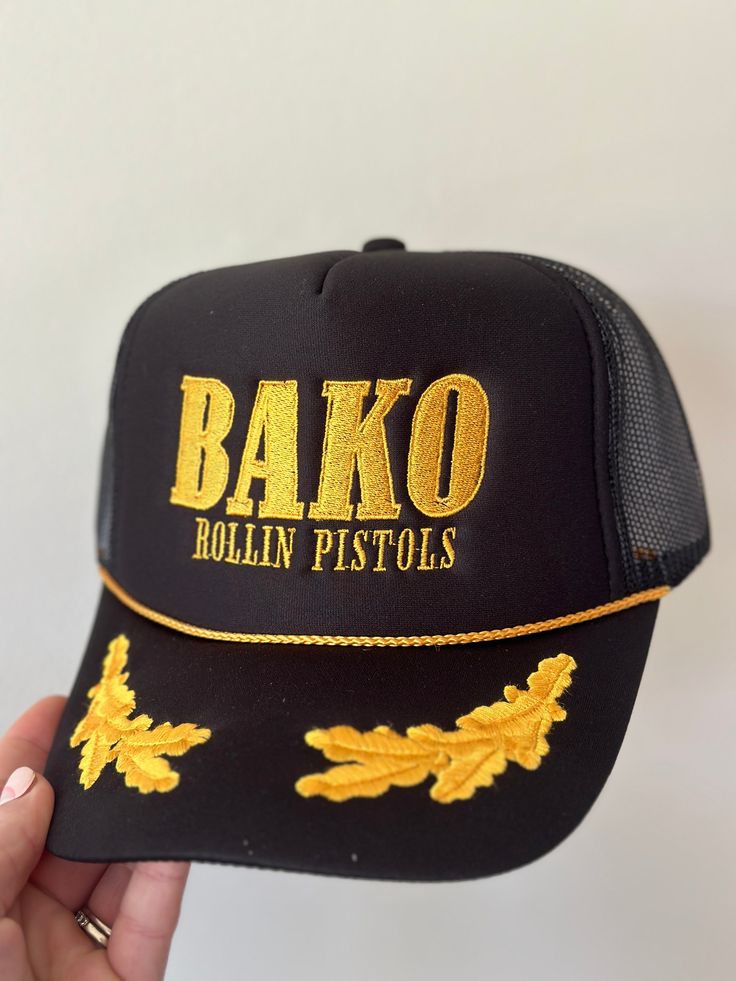 Rock this BAKO trucker hat that features trendy local gals and help support your local community at the same time! This stylish design is perfect for everyday wear and shows that you're an urban trendsetter with a heart of gold. Gold Casual Trucker Hat, Gold Casual Trucker Hat One Size, Gold Casual Trucker Hat, One Size Fits Most, Casual Gold Trucker Hat One Size, Casual Gold Trucker Hat One Size Fits Most, Gold Adjustable Flat Brim Trucker Hat, Casual Adjustable Gold Trucker Hat, Gold Adjustable Trucker Hat For Summer, Adjustable Gold Trucker Hat For Summer