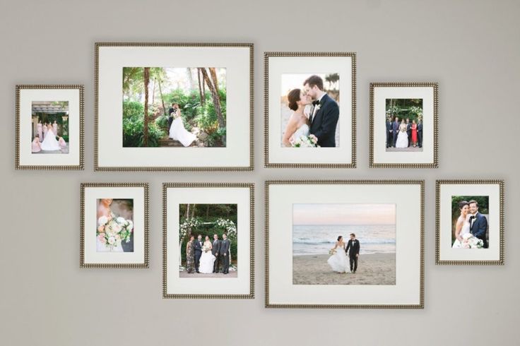 a group of pictures hanging on the side of a wall next to a couple kissing