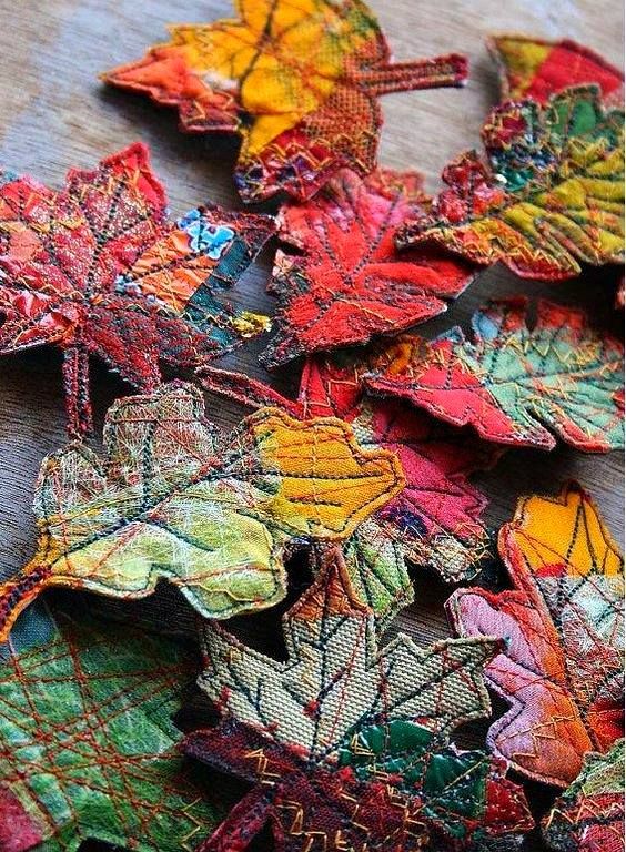 colorful autumn leaves laid out on a table