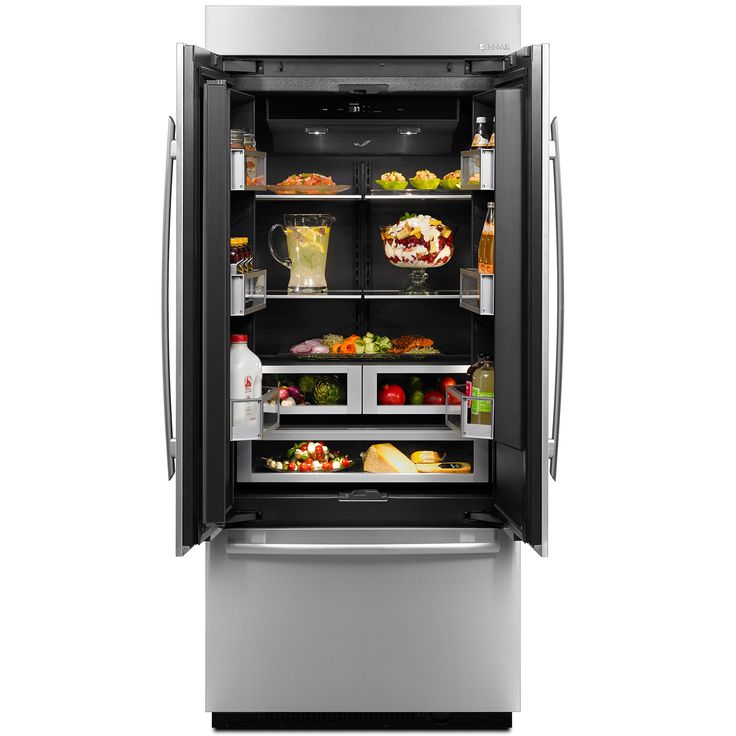 an open refrigerator with its doors wide open and full of food in the freezer