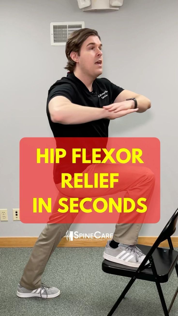 a man standing on top of a chair in front of a sign that says hip flexor relief in seconds