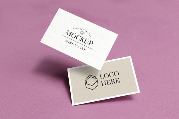 two business cards on top of each other with the word mockup printed on them