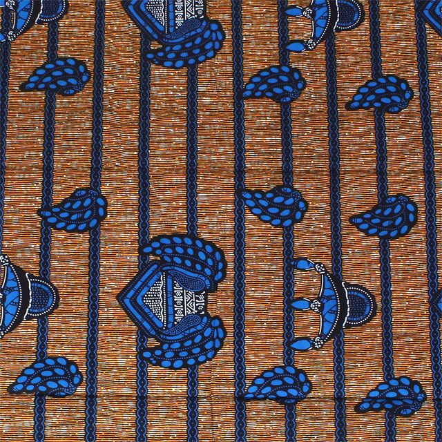 an orange and blue patterned tie with black lines on it's sides, featuring two lions