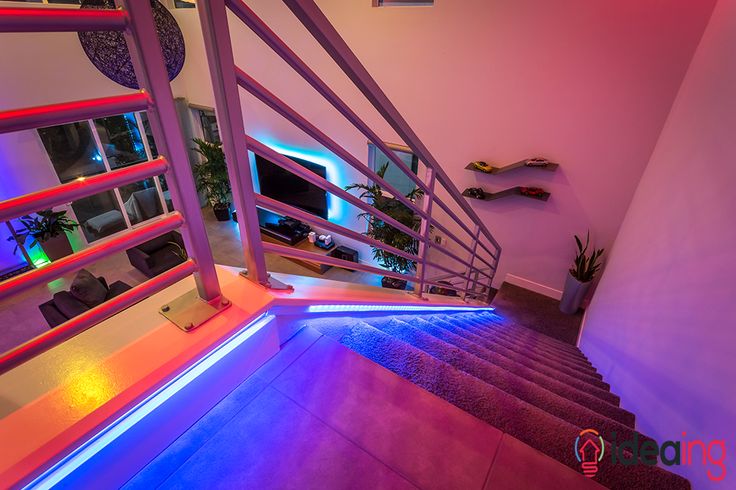 the stairs are lit up with colorful lights