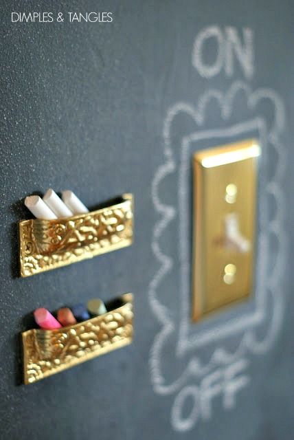 two switch plates with toothbrushes on the wall next to one light switch plate