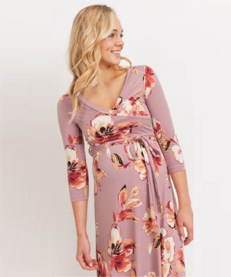 Our best-selling wrap dress is now available in the most perfect pink floral print for spring. Features high quality stretch fabric and 3/4 sleeves. Worn by pregnant, nursing, and postpartum mamas! As worn by "On Air with Ryan Seacrest" co-host, Sisanie, featured in People magazine. Color: Mauve Appearance of a wrap-dress, with out having to tie to close 95% Polyester, 5% Spandex Maternity, Postpartum & Nursing-Friendly Length measured from bustline to floor. S (0-4): Bust 33-36", Length 43" Spring Maternity V-neck Dress Nursing Friendly, Fitted V-neck Maternity Dress With Floral Print, Long Sleeve Nursing-friendly Maternity Dress For Spring, Spring Long Sleeve Nursing-friendly Maternity Dress, Long Sleeve Maternity Dress Nursing Friendly For Spring, Spring Long Sleeve Maternity Dress Nursing Friendly, Spring Long-sleeve Nursing-friendly Maternity Dress, Fitted Spring Maternity Dress, Spring Long Sleeve Maternity Dress