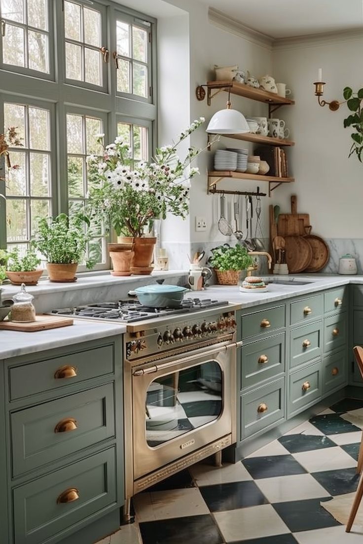 a kitchen with green cabinets and checkered flooring on the floor is pictured in this image