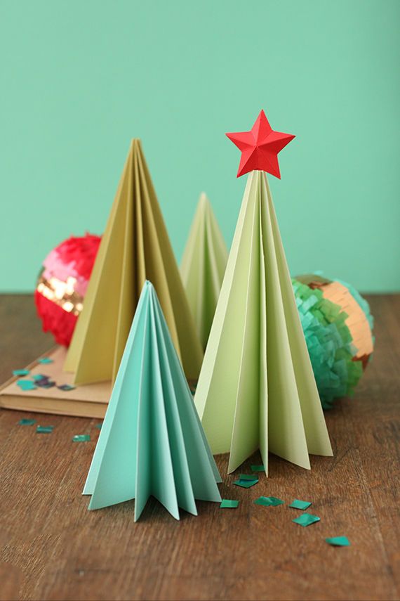 an origami christmas tree made out of folded paper