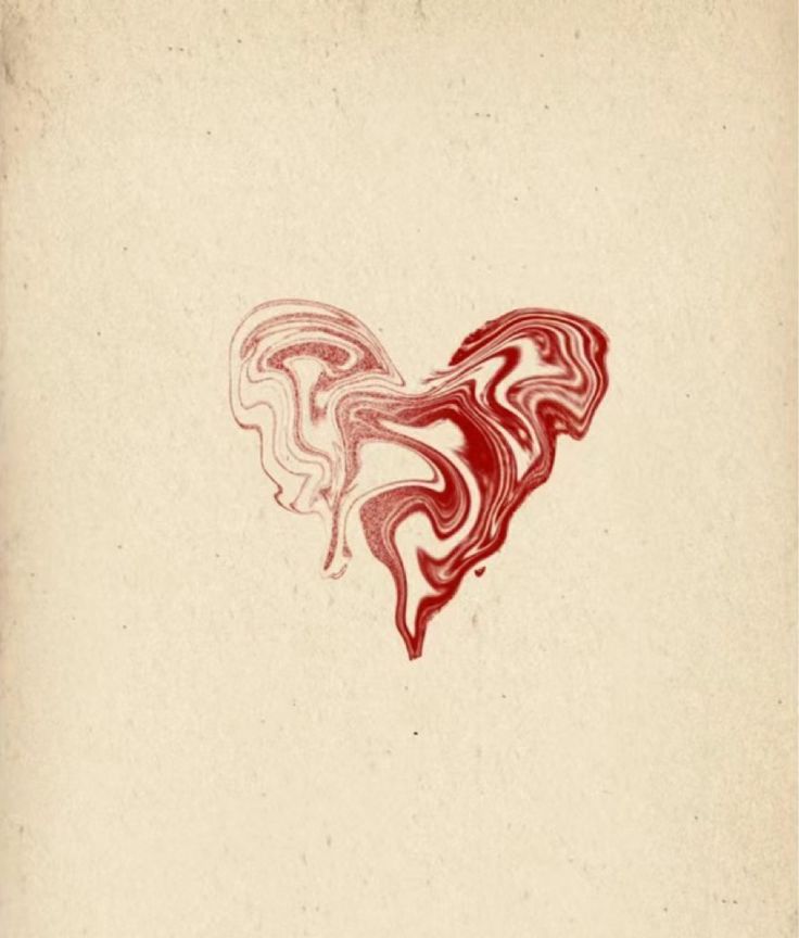 a red and white drawing of a heart