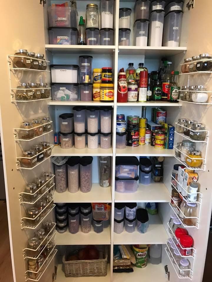 the pantry is stocked with all kinds of food