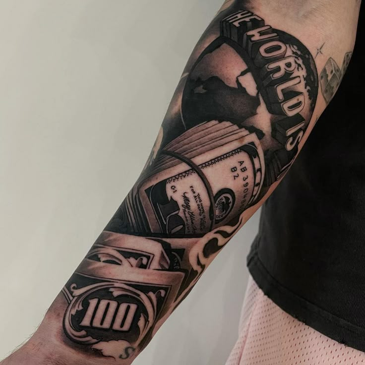 a man with a tattoo on his arm holding a cell phone and money in front of him