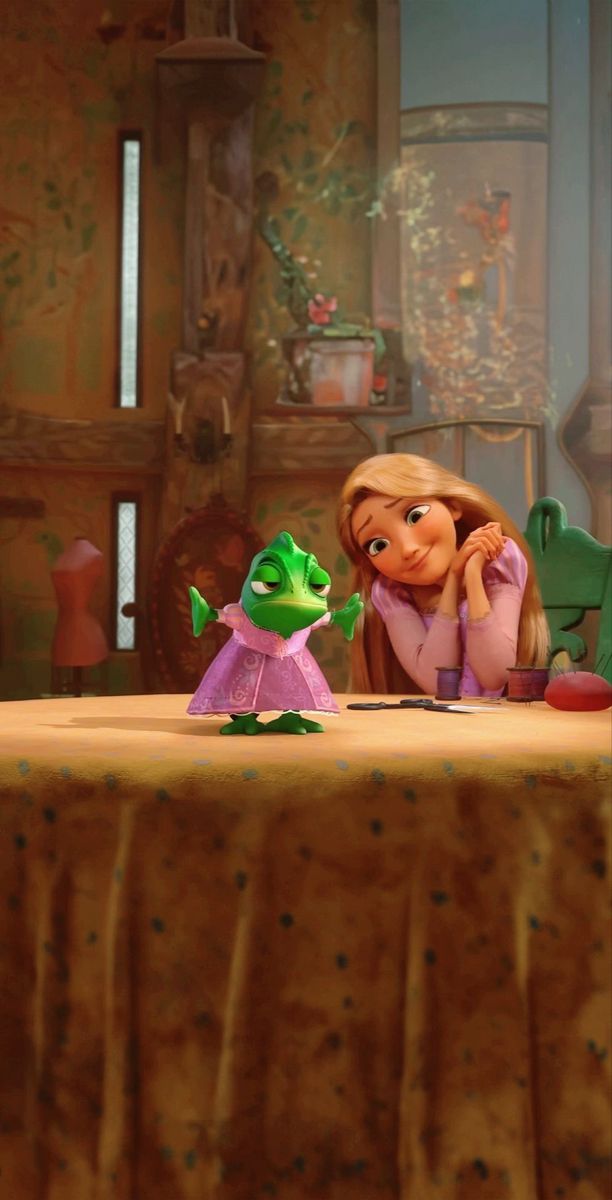 the frog and princess are sitting at the table