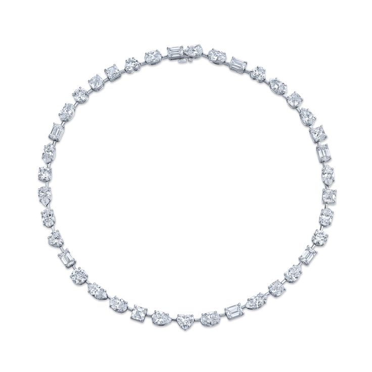 Mixed of fancy shaped diamonds in platinum necklace. 39 total stones 39.57 carat total weight Measures 15.25 in length.