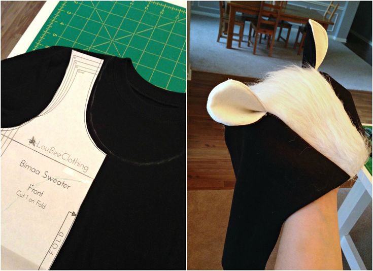 the back and side of a black shirt with white fur on it, next to a sewing pattern