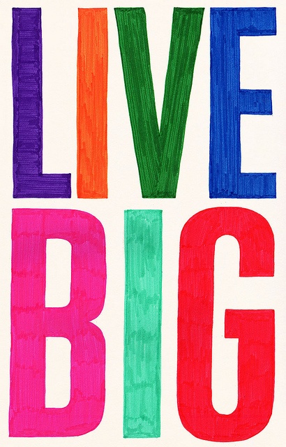 the words live big are painted in bright colors