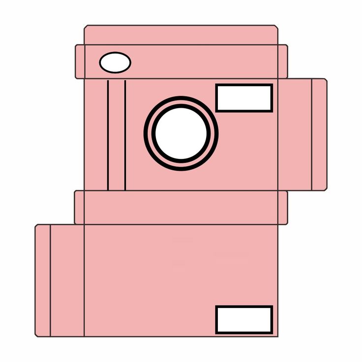 a pink camera sitting on top of a white surface with two black squares around it