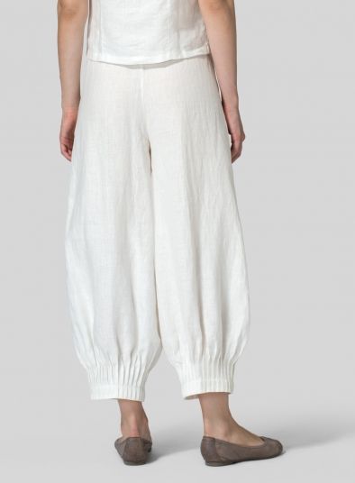 Linen Regular Fit Crop Pants Comfortable Linen Harem Pants For Spring, Spring Linen Harem Pants With Loose Fit, Linen Loungewear Bottoms Long Pants, Linen Long Pants For Loungewear, White Linen Harem Pants For Spring, Relaxed Linen Bottoms For Loungewear, Linen Loungewear Bottoms, Relaxed White Linen Bottoms, Comfortable Linen Wide Leg Pants For Spring