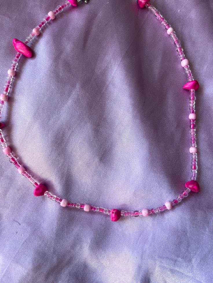 handmade elasticated pink bead necklace with silver fastenings & pink magnesite beads Adjustable Single Strand Pink Beaded Necklace, Adjustable Pink Beaded Necklaces With Colorful Beads, Adjustable Pink Beaded Necklace, Pink Beaded Necklaces With Round Beads, Pink Beaded Necklace With Round Beads, Adjustable Pink Necklace With Gemstone Beads, Adjustable Pink Gemstone Beads Necklace, Pink Single Strand Beaded Necklace For Gift, Pink Beaded Necklaces With Heart-shaped Beads