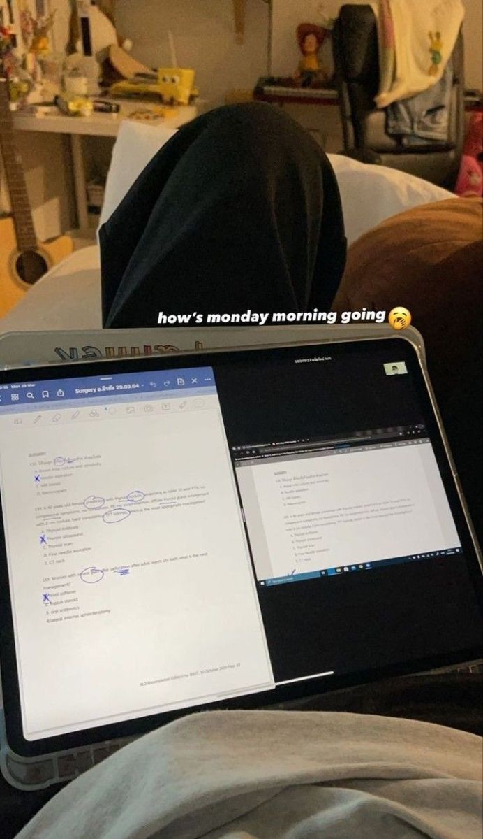 a laptop computer sitting on top of a person's lap