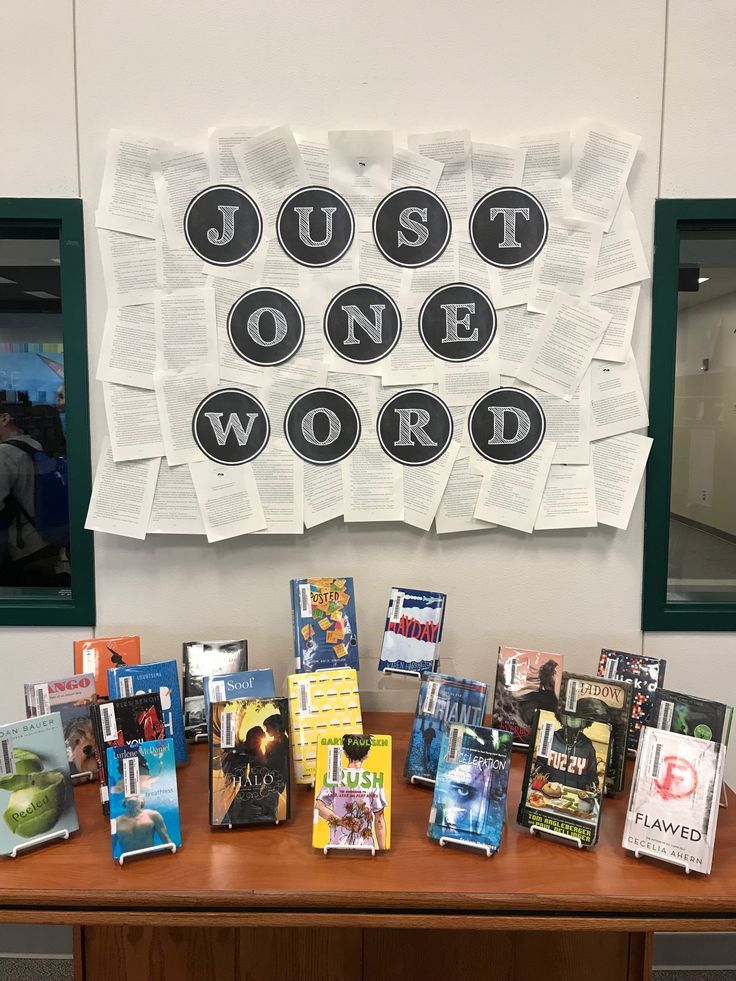 a table topped with lots of books on top of it