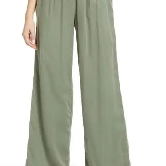 Elastic Waist Wide Leg Pants Caslonpull On Wide Leg Pants Color Green Dune True To Size S=4-6 High Rise 26 1/2" Inseam; 16" Leg Opening; 11 1/2" Front Rise; 16 1/2" Back Rise Elastic/Drawstring Waist Slant Pockets 100% Cotton Machine Wash, Line Dry Chic Green Relaxed Fit Bottoms, High-waisted Rayon Pants For Spring, Green Rayon Bottoms For Day Out, Spring Workwear Rayon Bottoms, Chic Pull-on Pants For Day Out, Rayon Trousers For Day Out, Elegant Green Relaxed Fit Pants, Elegant Rayon Bottoms For Day Out, Elegant Green Bottoms For Day Out