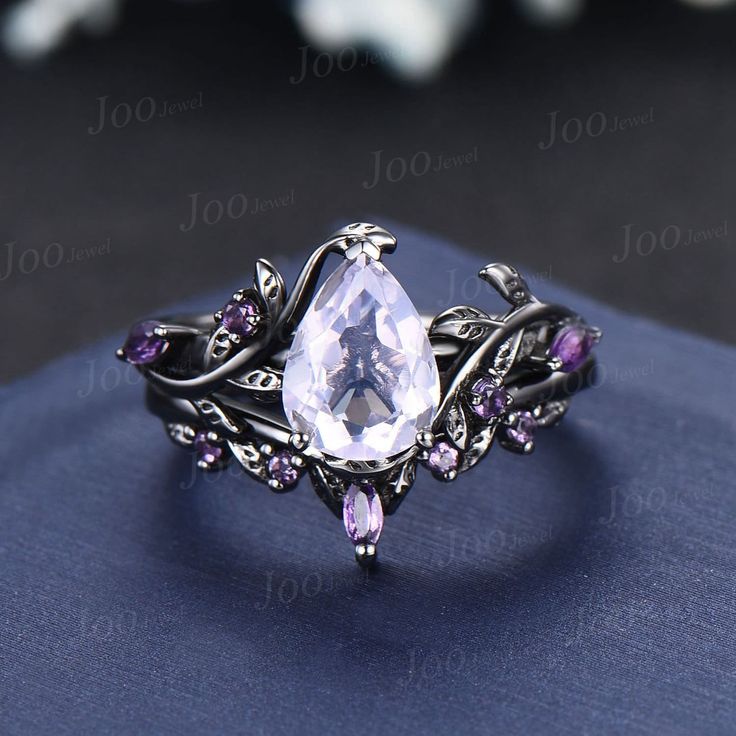 Main Ring : 6*8mm pear cut Lavender Amethyst Side stone : amethyst Matching Band: amethyst Material Metal: 925 sterling silver, Solid 14k/18k gold, platinum PLEASE choose silver or platinum if you are allergic to nickel. This jewelry is made to order, it can be made with any gemstone/metals. 2-3 weeks to finish. Default Shipping method is usps. 30 days non-hassle return policy.For returned items,there may be handcrafting and shipping fee deducted. Purple Wedding Rings, Black Gold Wedding Rings, Amethyst Wedding Rings, Fantasy Ring, Amethyst Engagement Ring, Black Gold Wedding, Lavender Amethyst, Amethyst Ring Engagement, Cute Engagement Rings