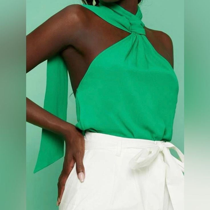 Backless Halter Top Chic Green Halter Top For Party, Chic Halter Top For Evening In Summer, Chic Summer Halter Top For Evening, Chic Halter Top For Summer Evenings, Chic Summer Evening Halter Top, Chic Green Halter Neck Top, Chic Halter Top For Day Out, Green Summer Evening Tops, Summer Evening Green Tops