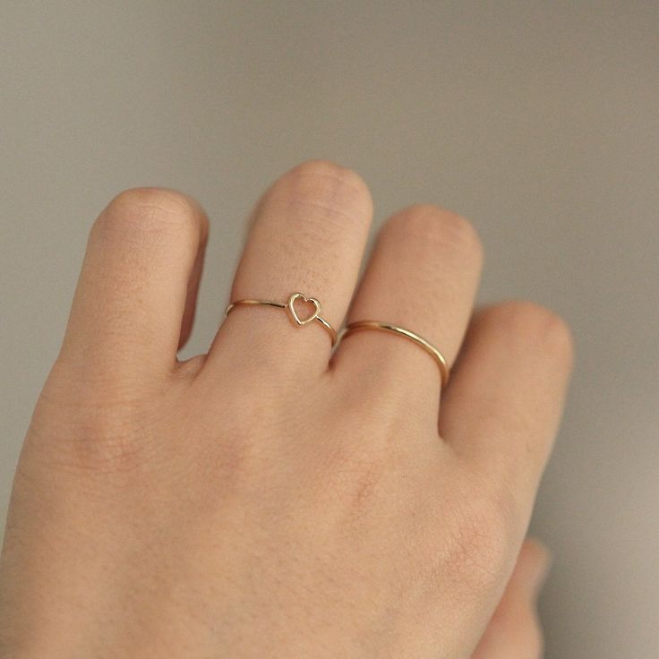 Heart Ring, 14K Solid Gold Open Heart Ring, 14K Wedding Ring, Engagement Ring, Minimalist Ring, 14K Solid Gold Ring, Promise Ring, Love Ring ≫ Product Details ◈ Handmade / Handcrafted Fine Jewelry ◈ Thickness: 1.2 mm ◈ Metal: Solid 14K Gold ◈ Gold Color: White gold, Rose gold, Yellow gold ≫ Please read our FAQ below for more detail. Minimalist Heart Shaped Stackable Promise Rings, Minimalist Rings With Heart Charm For Everyday, Minimalist Stackable Rings With Heart Charm For Promise, Minimalist Everyday Ring With Heart Charm, Dainty 14k Gold Stackable Heart Ring, Minimalist Midi Rings With Heart Charm For Promise, Minimalist Heart Charm Ring For Everyday, Minimalist Heart Charm Ring For Everyday Wear, Minimalist Midi Rings With Heart Charm For Wedding