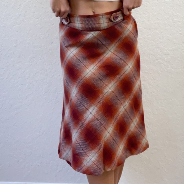 Get ready for fall with Highway Ave's Y2K plaid midi skirt, priced at an affordable $30. This trendy piece seamlessly blends retro and modern styles, making it perfect for autumn outings or casual chic looks. Embrace nostalgia with our highly sought-after plaid midi skirt and stay on-trend this season. Don't miss out – place your order today for the perfect autumn wardrobe addition! Fall Midi Length Relaxed Pencil Skirt, Casual Plaid Midi Skirt, Plaid Midi Skirt Casual Style, Casual Plaid Skirt For Fall, Casual Midi-length Pencil Skirt For Fall, Chic Plaid Flared Skirt, Chic Plaid Pleated Skirt, Plaid Midi Skirt For Fall, Fall Midi-length Lined Pencil Skirt