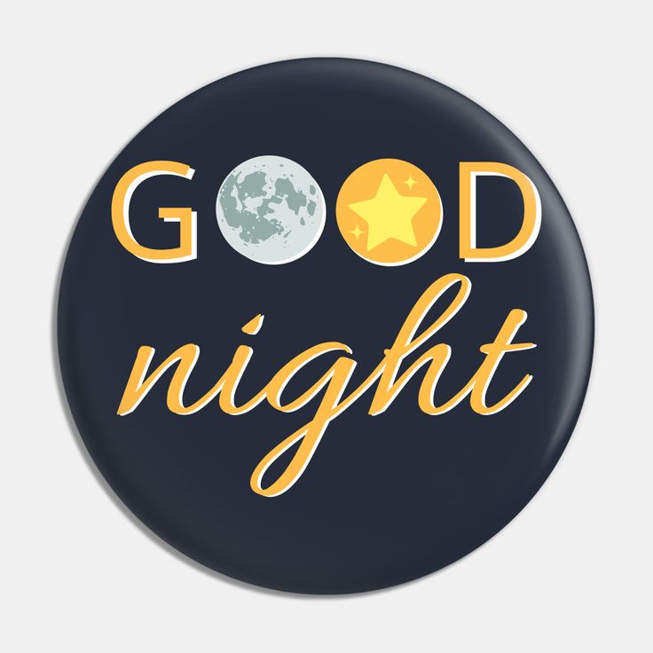 a button with the words good night written in yellow and blue, on a dark background