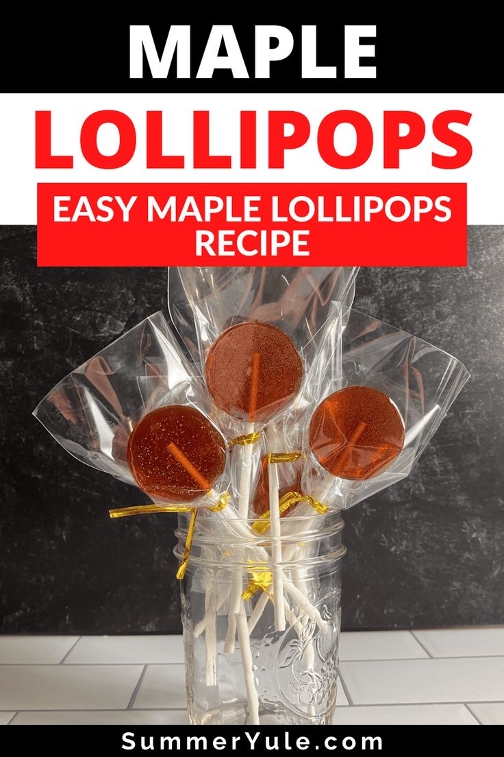 lollipops are wrapped in cellophane and sitting in a jar