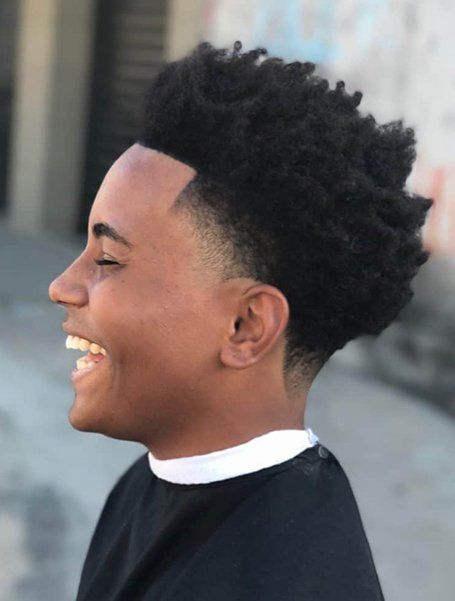 20 Coolest Fade Haircuts for Black Men in 2021 - The Trend Spotter Mens Blowout, Blowout Afro, Blowout Haircuts, Blowout Taper, Taper Fade Afro, Blowout Hairstyle, Types Of Fade Haircut, Blowout Haircut, Fade Haircut Designs