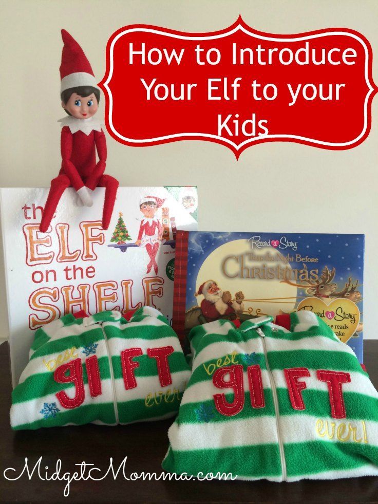 an elf is sitting on top of two christmas pillows with the caption your elf to your kids