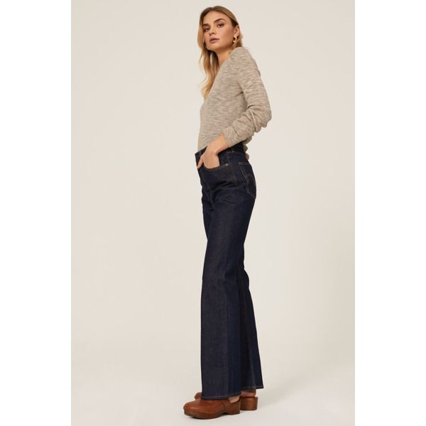 Blue denim (99% Cotton, 1% Elastane). Jeans. Front button fly closure. 33" inseam, 12" rise, 19.5" leg opening. Imported. Spring Flare Jeans In Rigid Denim With Standard Cut, Denim Blue Wide Leg Flare Jeans For Fall, Wide Leg Denim Blue Flare Jeans For Fall, Wide Leg Flare Jeans In Denim Blue For Fall, Fall Denim Flare Jeans Full Length, High Rise Denim Flare Jeans For Fall, Classic Denim Blue Bottoms For Fall, High Waist Denim Blue Jeans For Fall, Chic High Rise Jeans For Fall