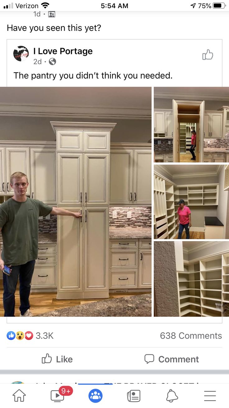 a man standing in front of some cabinets