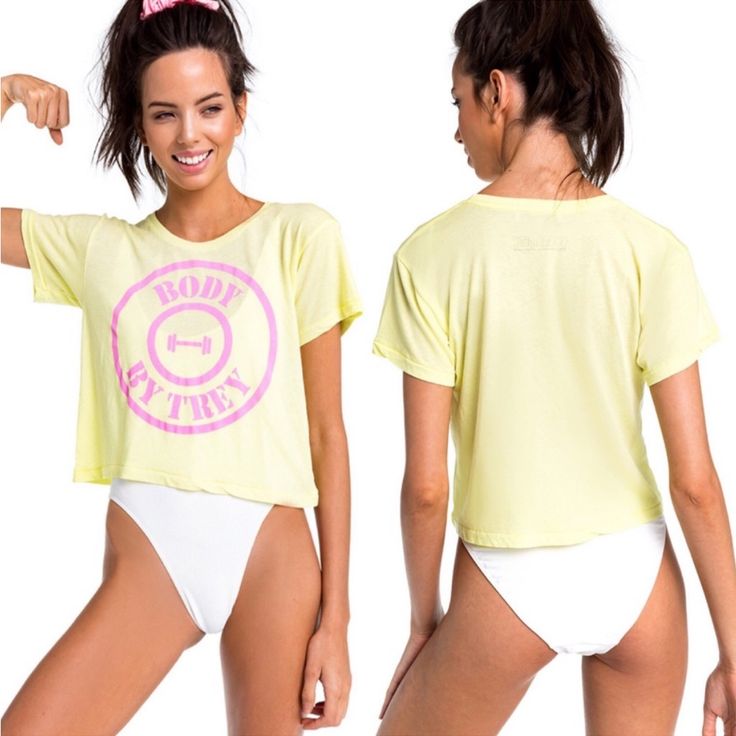 This Is A Nwt Wildfox Body By Trey Middie Tee. No Flaws. Size Xs Armpit To Armpit- 17in Length - 17in 50% Polyester & 50% Cotton Athleisure Short Sleeve Beach Tops, Yellow Sporty Crop Top For Summer, Trendy Stretch Yellow T-shirt, Trendy Yellow Stretch T-shirt, Sporty Yellow Crop Top For Summer, Yellow Cotton Short Sleeve Crop Top, Yellow Cotton Crop Top With Short Sleeves, Yellow Graphic Tee For Sports, Trendy Yellow Crop Top With Graphic Print