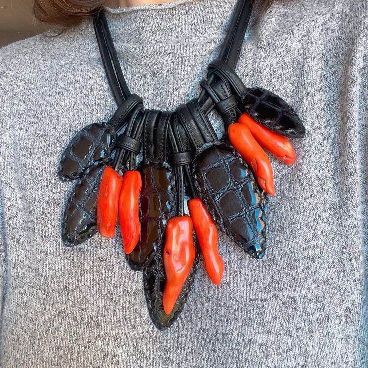 Large Statement Necklace, Coral Chunky Pendant Necklace, Black Boho Leather Bib Necklace, Bohemian Leather Necklace, African Tribal Necklace One-of-a-kind pendant necklace for a special woman. ✴ WOULD YOU LIKE TO HAVE A STRIKING ACCESSORY TO ELEVATE YOUR LOOK IN A SINGLE GESTURE? This accessory will add value to the casual, most neutral looks and more elaborate compositions, allowing them to be elevated to another level. This is a one-of-a-kind handcrafted piece that every confident and empowere Handmade Black Leather Necklace, Handmade Black Leather Jewelry, Unique Leather Necklace, Unique Black Leather Jewelry, Unique Black Necklace, Unique Leather Jewelry For Parties, Unique Handmade Black Bib Necklaces, Unique Handmade Black Bib Necklace, Bohemian Black Leather Necklace