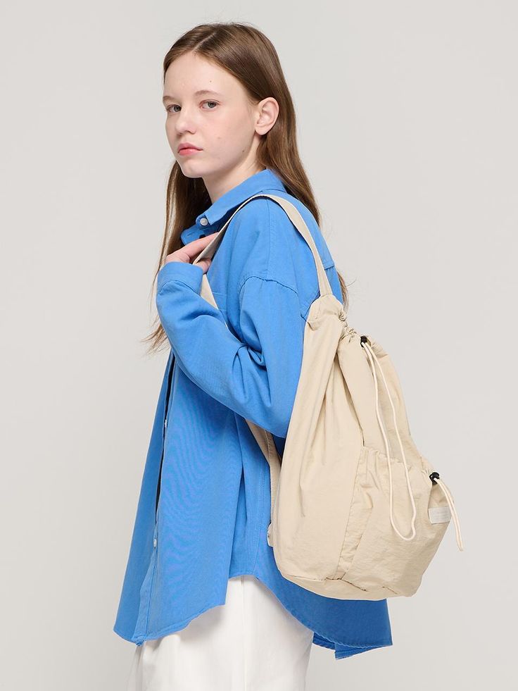 Composition : POLYESTER 100%Country of Origin : KOREA Casual Crossbody Backpack With Anti-theft Pocket, Casual Beige Shoulder Bag For School, Beige Travel Bag With Anti-theft Pocket, Khaki Travel Chest Backpack, Everyday Beige Bucket Bag With Pockets, Beige Chest Backpack For School, Beige Chest Bag Backpack For School, Beige Chest Bag For School, Beige Backpack Chest Bag For School