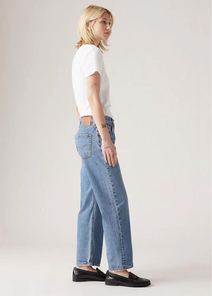 501 is a Levi's Classic... now with a 90's twist. They designed this 501® ‘90s Ankle Denim with a classic mid-rise, an ankle-length cut and a loose, straight fit with just the right amount of bagginess through the leg. They're the vintage jeans you've always dreamed of finding at the thrift store, but without all the rummaging. Mid-rise (10.5") with a loose fit that's just right For a slimmer fit, try one size down Sweetest Taboo is a classic Medium Wash denim FIT: Loose Through Your Hip And Thi Classic Straight Jeans, Levi's 501, Levis 501, Wide Brimmed Hats, Swim Accessories, Sweater Blouse, Vintage Jeans, The Vintage, Straight Jeans