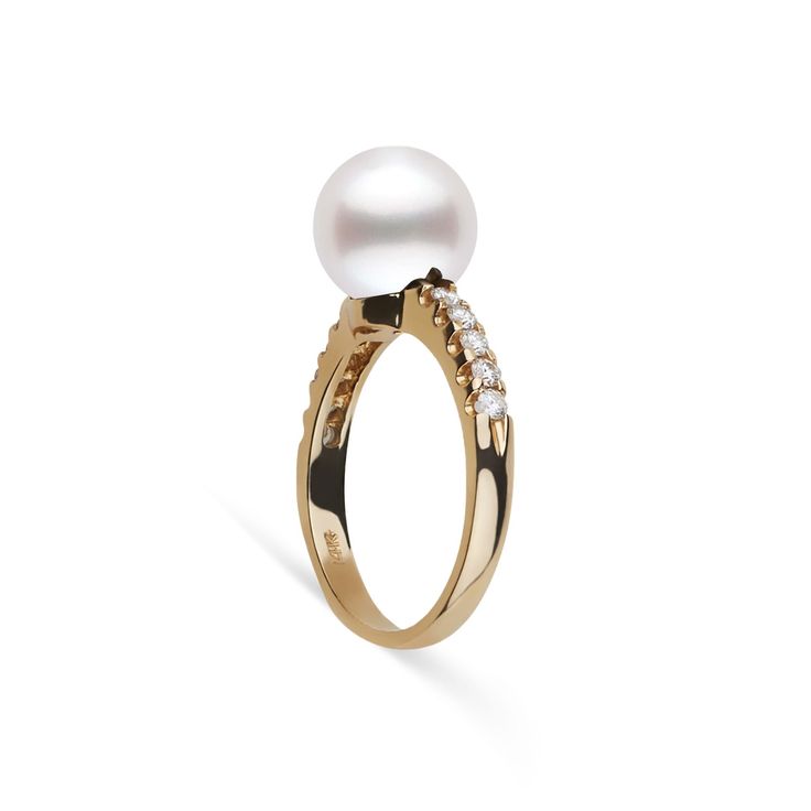 This 9.0-10. mm AAA quality White South Sea pearl ring showcases the pure organic beauty of elegant south sea pearl. The flawless pearl appears to float above the gold, yet is securely attached by a strong post. The classic-style ring features a solid 14-karat gold band that is set with 0.25 carats of diamonds. The ring setting is made in-house and is composed of solid 14 karat gold. We use an extra-fine diamond grade (VS1-G), which is normally reserved for solitaire settings. It's rare to see t Luxury Akoya Pearl Ring With Pearl Drop, Timeless White Akoya Pearl Ring, White Akoya Pearl Timeless Ring, Elegant Akoya Pearl Ring With Pearl Drop, Elegant Akoya Pearl Drop Ring, Timeless Akoya Pearl Drop Ring, Formal Akoya Pearl Ring In Fine Jewelry Style, Akoya Pearl Ring For Formal Occasions, Formal Akoya Pearl Fine Jewelry Ring