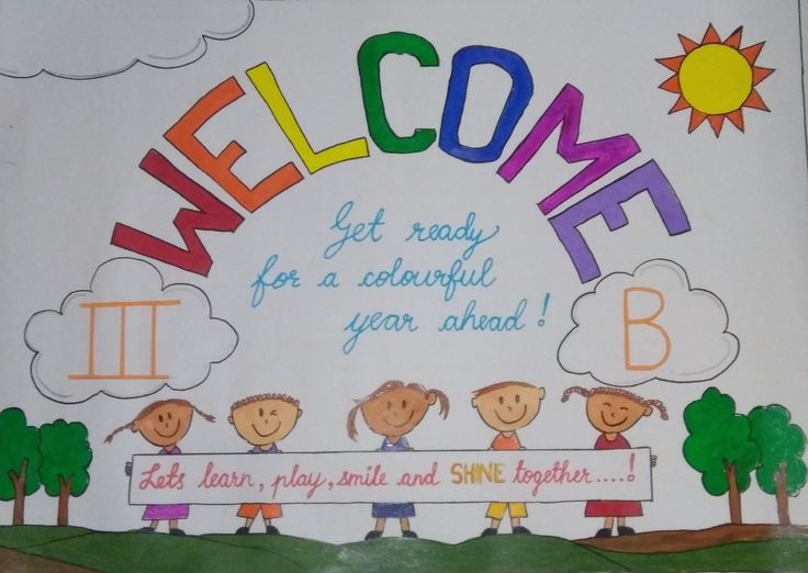 a welcome sign with children holding a banner