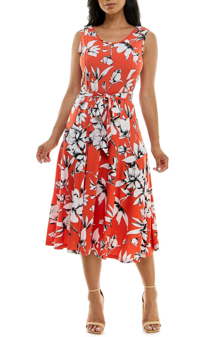 A vibrant printed midi dress is perfect for summer events. Fit: this style fits true to size. 50" length (size Medium) Crewneck Sleeveless Attached waist tie 95% polyester, 5% spandex Machine wash cold Imported Model stats: 5'10", 32" bust, 25" waist, 36" hip. Model is wearing size Medium. Sleeveless Midi Dress For Summer Garden Party, Summer Sleeveless Midi Dress For Garden Party, Printed Sleeveless Dress For Garden Party, Summer Printed Sleeveless Dress For Garden Party, Summer Garden Party Printed Sleeveless Dress, Summer A-line Maxi Dress With Tie Waist, Summer Midi Sleeveless Dress With Floral Print, Orange Sleeveless Dress For Summer Day Out, Floral Print Sleeveless Midi Dress For Vacation