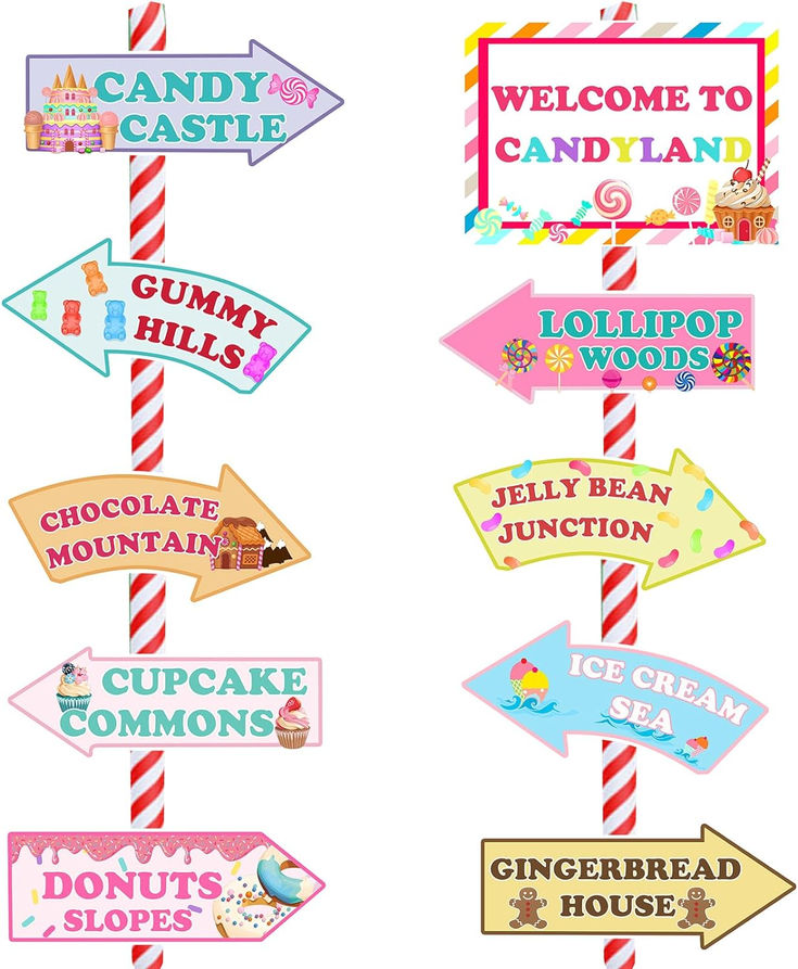 candy shop signs are hanging from a pole