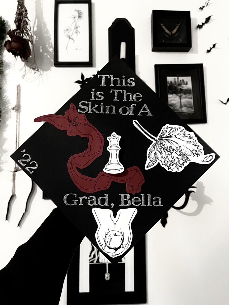 a graduation cap with the words, this is the skin of a gradbella