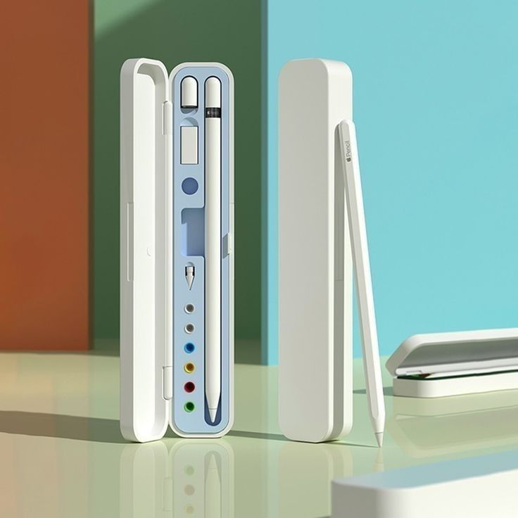 two nintendo wii controllers sitting next to each other on top of a table in front of a blue and green wall