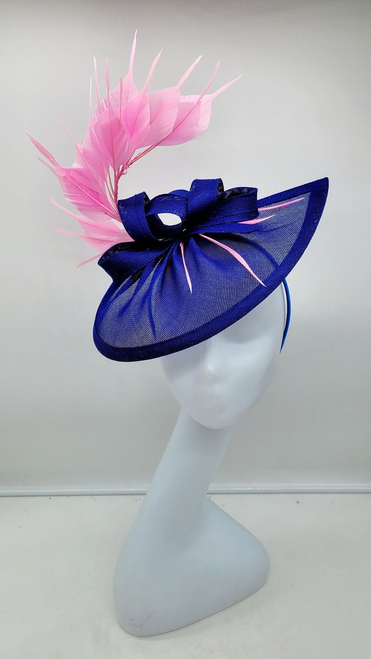 Elegant royal blue and PinkFascinator Classic style to go with a variety of outfits: bridesmaids,  cocktail party,  Kentucky Derby, Rehearsal dinner, Easter and church outfits.  Ones with hair clip and headband.  - Rare find - Lightweight  - Ready to ship - Fast Shipping - Free Shipping - Group discount available - Customize by adding different color flowers and or feathers - Headband and Hair clip  It comes in other colors see their links below: CHECK OUT MY STORE FOR OTHER STYLES & COLORS: etsy.com/shop/Hatsandpearls Find more at my website for more styles: www.hatsandpearls.com  Reach out to me if you can't find what you are looking for.  I can make cake custom orders and help you style and match your outfit  Tag and share your pictures when you wear and style our hats.  Instagram: @hat Elegant Mini Hats For Wedding And Carnival, Elegant Wedding Fascinator For Carnival, Fitted Fascinator For Royal Ascot Party, Elegant Fitted Fascinator For Carnival, Elegant Fitted Carnival Fascinator, Adjustable Mini Hats For Royal Ascot Party, Kentucky Derby Party Hat With Pinched Crown, Adjustable Mini Hat For Kentucky Derby Party, Adjustable Royal Ascot Costume Hats For Party