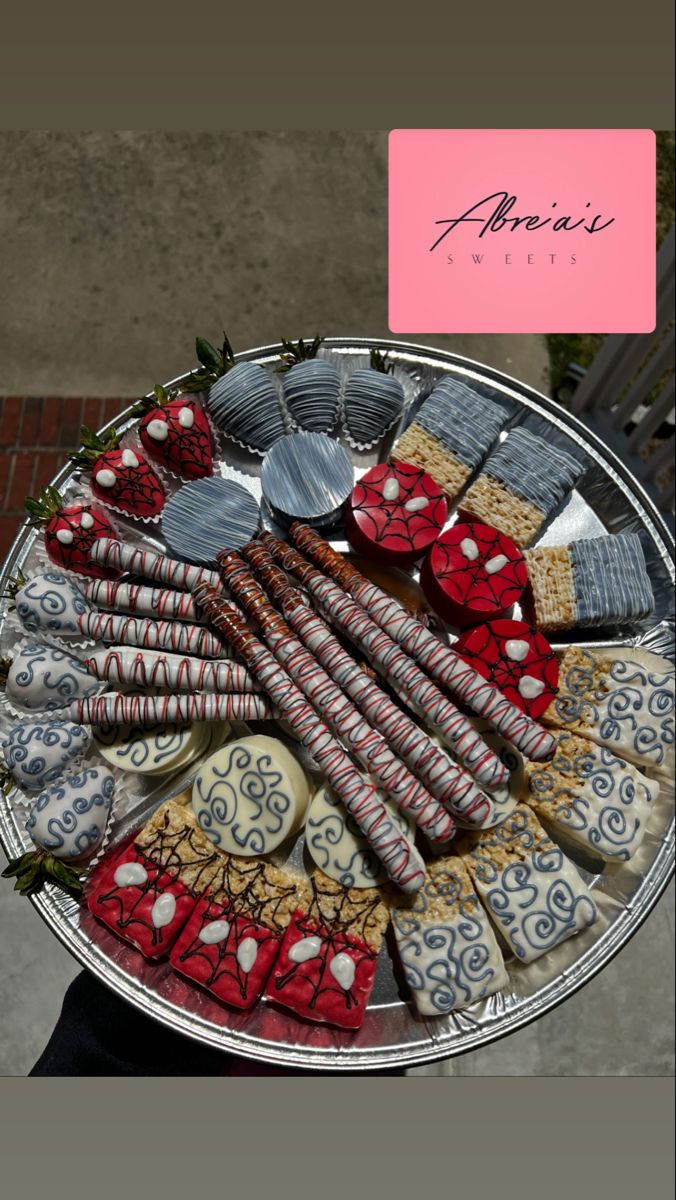 a platter filled with lots of different types of cookies