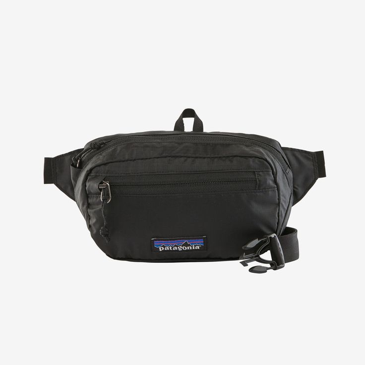 Made from extremely lightweight yet tough fabric, this handy hip pack stuffs into its own pocket when not in use and expands to carry small essentials for everyday use. The main compartment features a key clip and a security pocket that doubles as the pack’s stuffsack. The soft, flexible webbing belt lets you carry the Mini around your hips or off the shoulder, bandolier-style. Made from 2.4-oz 70-denier 100% recycled nylon (50% postconsumer recycled/22% solution-dyed) ripstop treated with a sil Hip Pack, Black Holes, Webbing Belt, Ripstop Fabric, Water Repellent Fabric, Hip Bag, Waist Pack, Black Hole, Bagpack