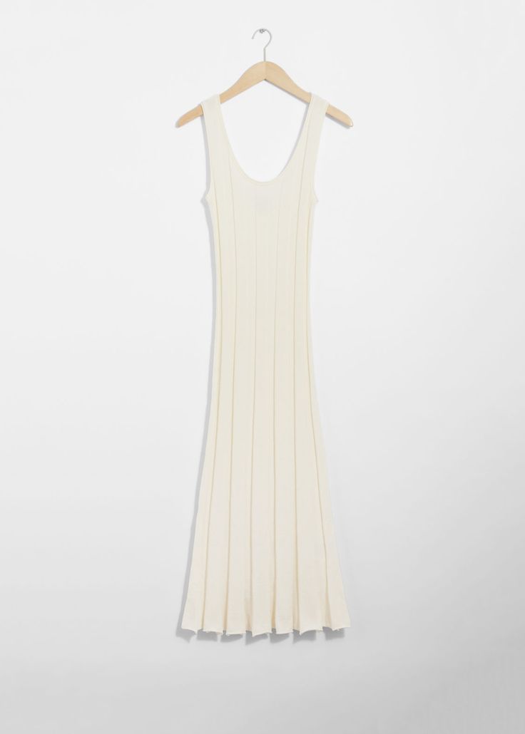 Tank midi dress finished with a ribbed structure and a deep neckline.• Slim fit• Sleeveless • Length of dress:118.5cm / 46.7" (Size S) Elegant Ribbed V-neck Maxi Dress, Elegant Ribbed Summer Dress, Ribbed Bodycon Sleeveless Dress For Spring, Elegant Stretch Ribbed Sleeveless Dress, Sleeveless Ribbed Midi Dress For Spring, Spring Sleeveless Ribbed Midi Dress, White Ribbed Sleeveless Midi Dress, Ribbed Sleeveless Dress For Summer, Sleeveless Ribbed Maxi Dress For Summer